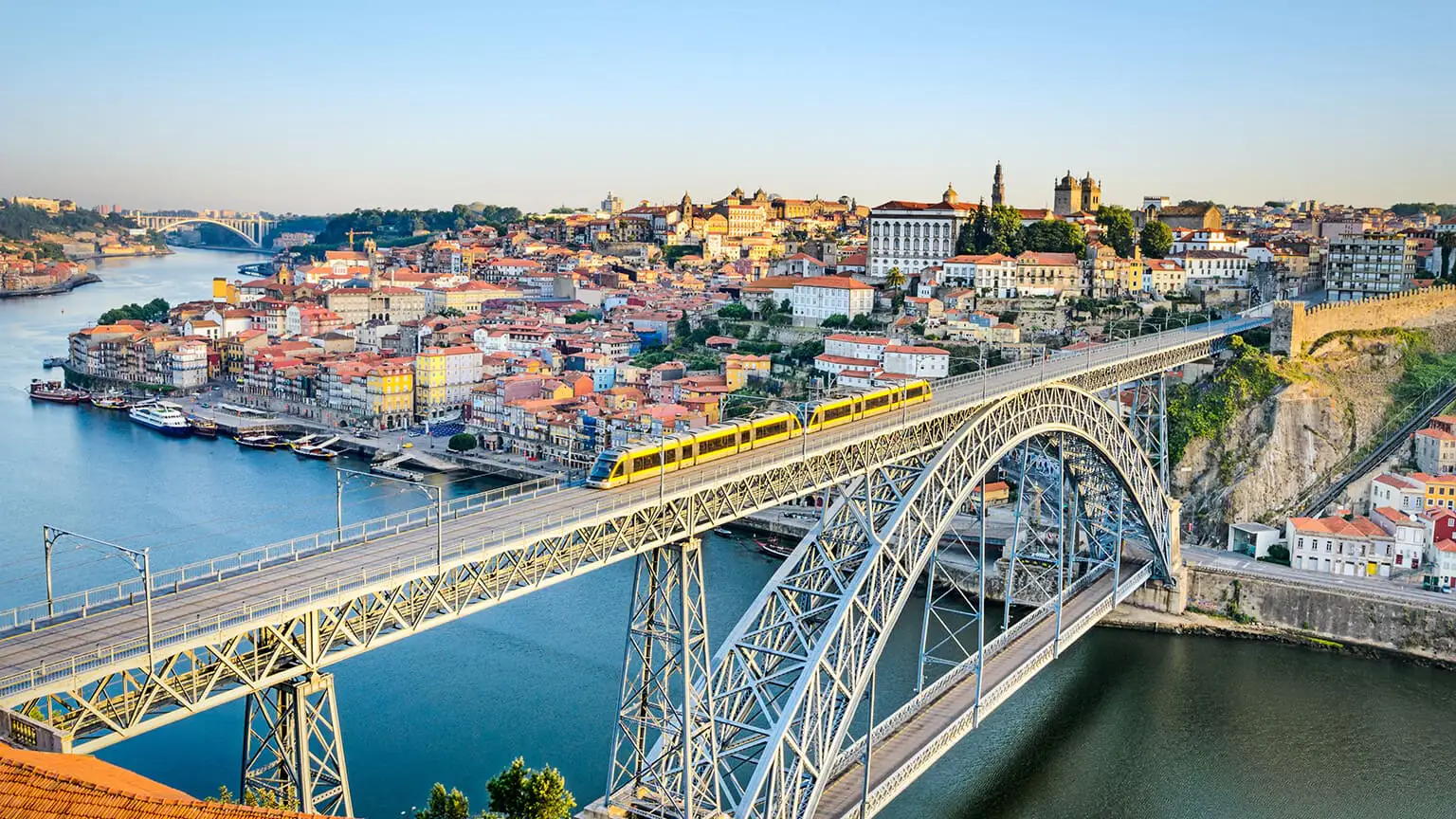 Beautiful Portugal coastline with historic architecture, highlighting a safe European country in 2025