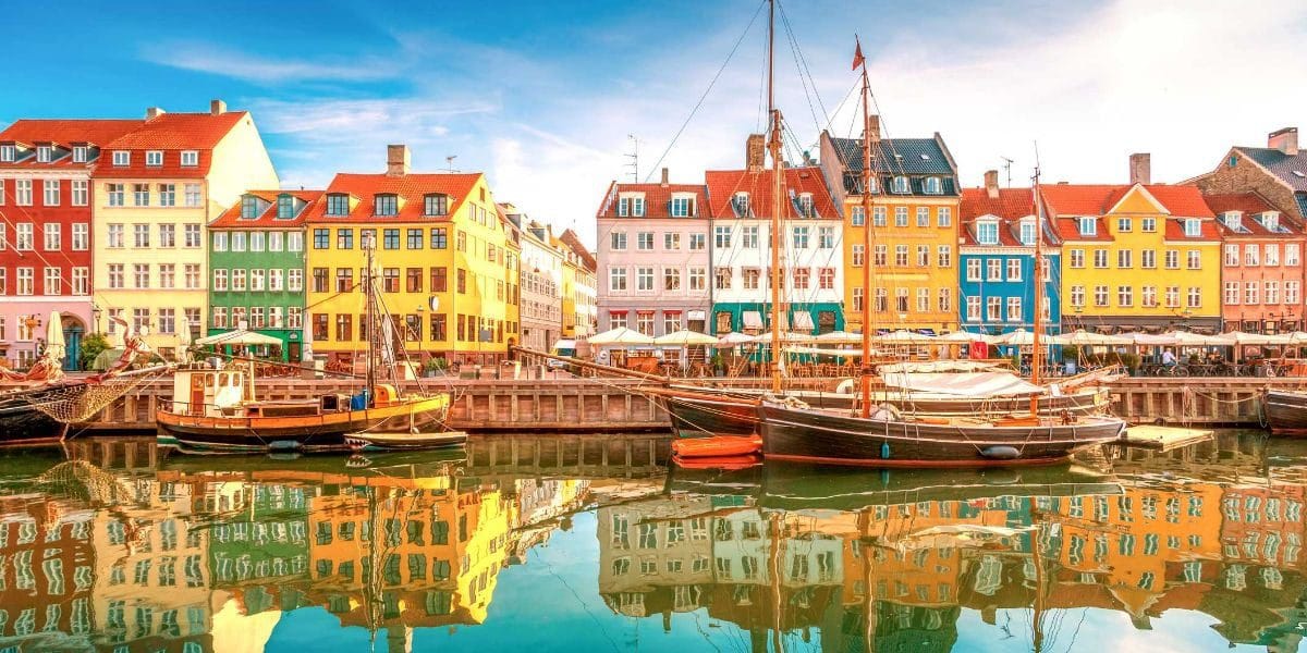 Copenhagen colorful houses and waterfront, representing Denmark as one of the safest countries 2025